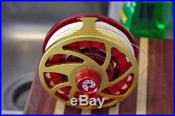 Custom Nautilus NVG 8/9 fly reel with 9wt line and factory reel sleeve. Perfect